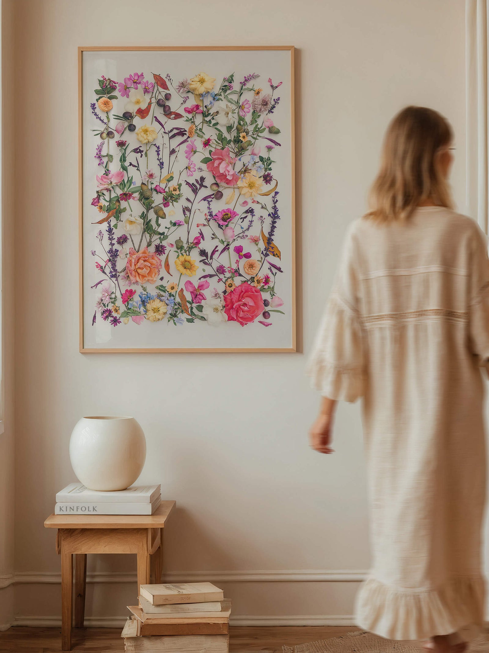 Woman walking past fine art print Autumn WInd