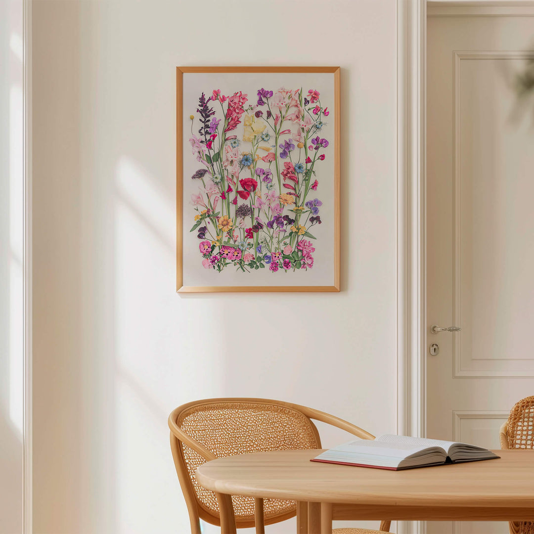 Poppy and Gladiolus wall art near table with book